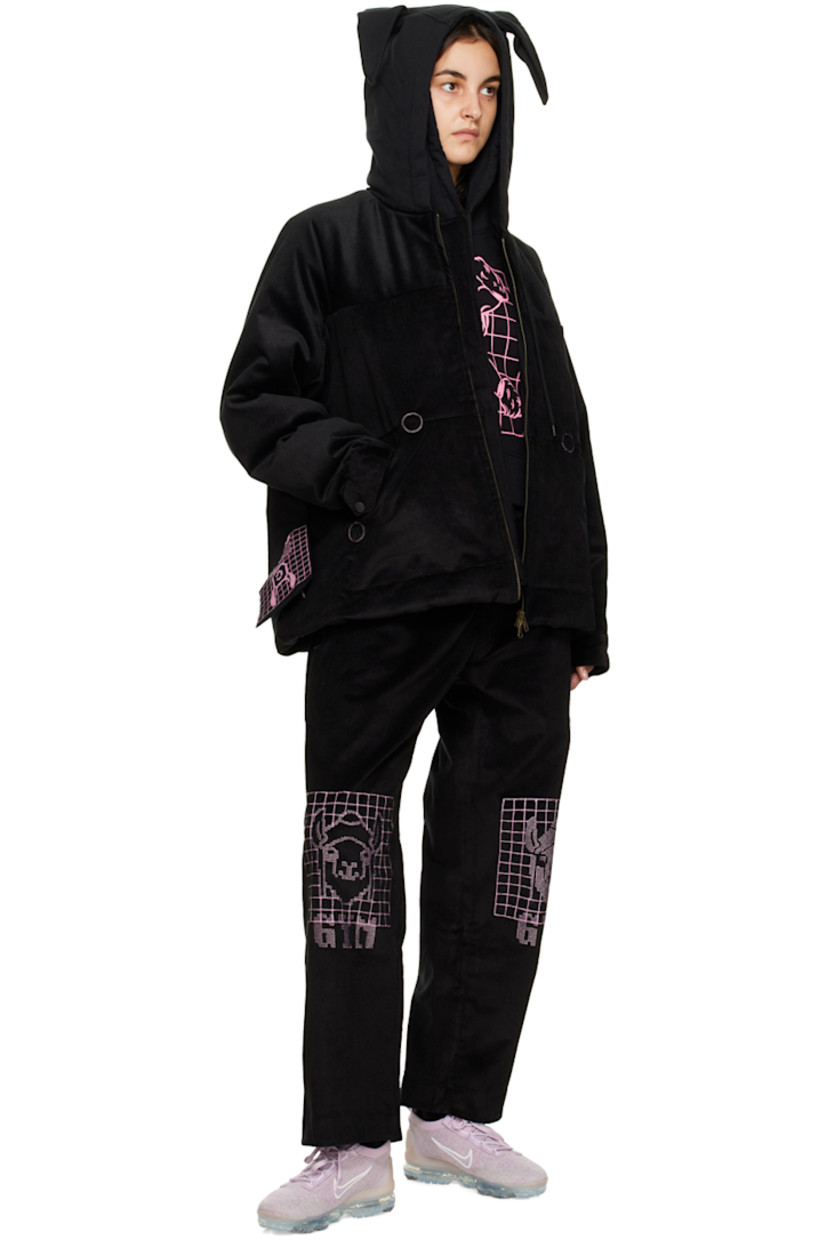 Wide-leg stretch cotton corduroy lounge pants. 

· Drawstring at elasticized waistband
· Three-pocket stylng
· Button-fly
· Graphics embroidered at front

Supplier color: Black