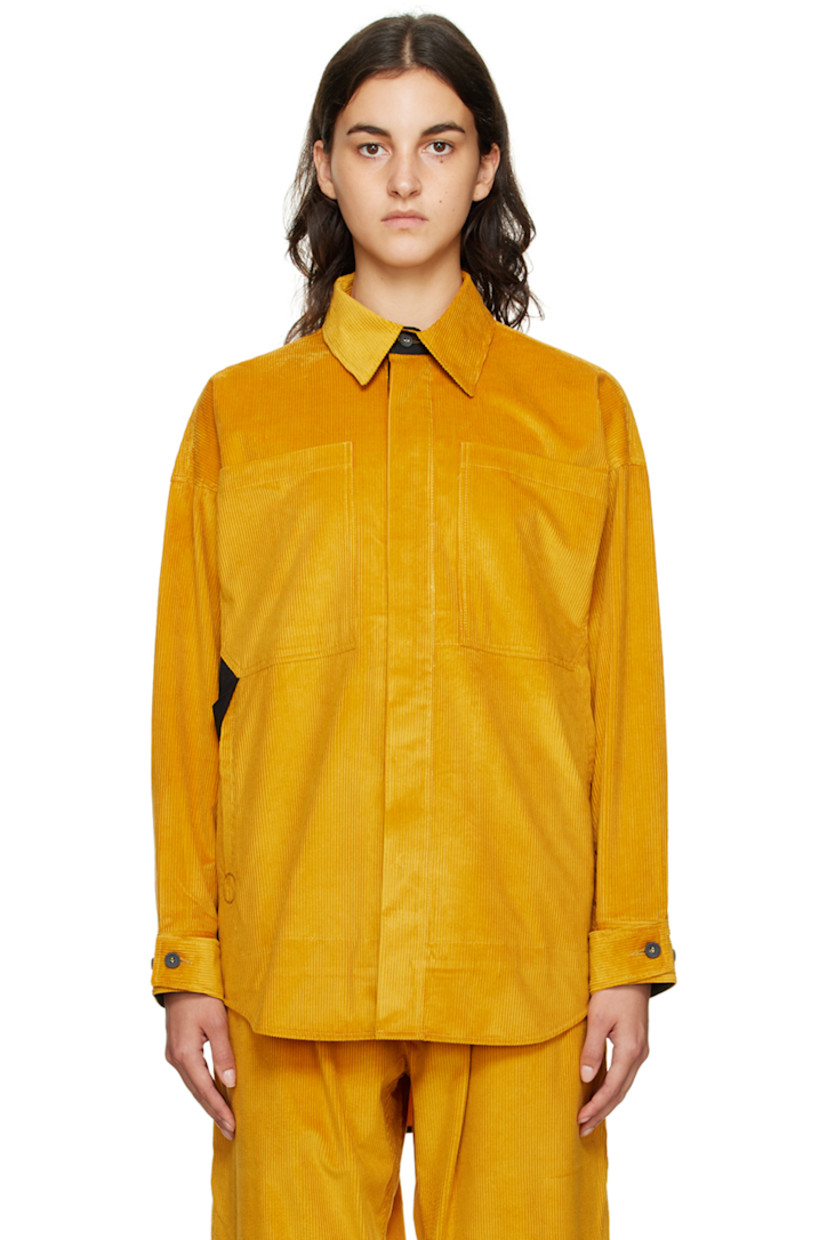 Stretch cotton corduroy shirt. 

· Spread collar
· Concealed button closure 
· Patch pockets and welt pockets
· Adjustable single-button barrel cuffs
· Graphic embroidered at back
· Droptail hem
· Black hardware

Supplier color: Yellow