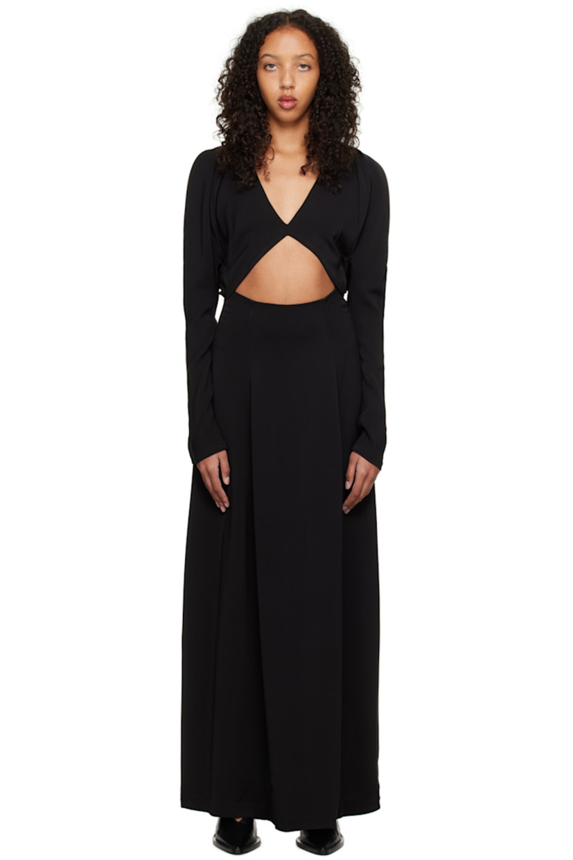Stretch viscose jersey dress. 

· Deep V-neck
· Cut out at front and back 
· Button fastening at back collar 

Supplier color: Black