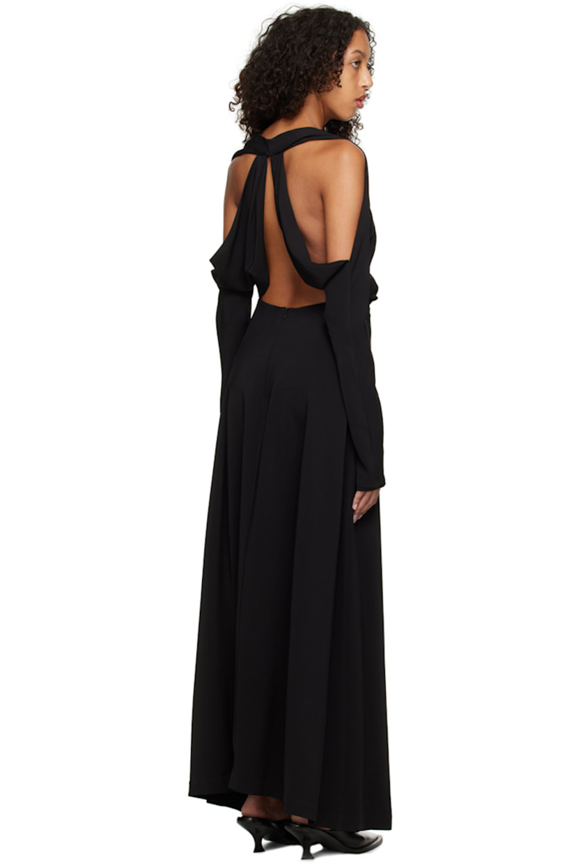 Stretch viscose jersey dress. 

· Deep V-neck
· Cut out at front and back 
· Button fastening at back collar 

Supplier color: Black