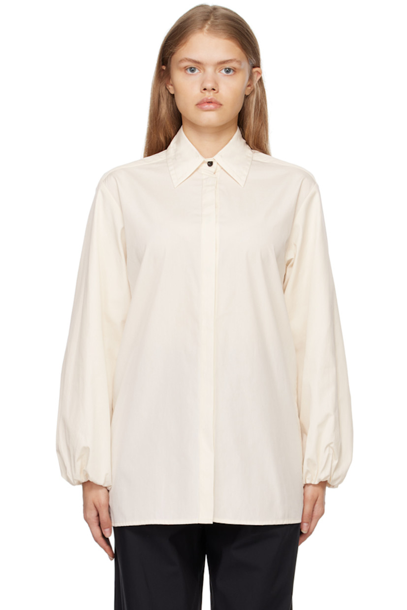 Organic cotton-blend poplin shirt. 

· Spread collar 
· Concealed button closure 
· Elasticized cuffs
· Box pleat at back 

Supplier color: Crema