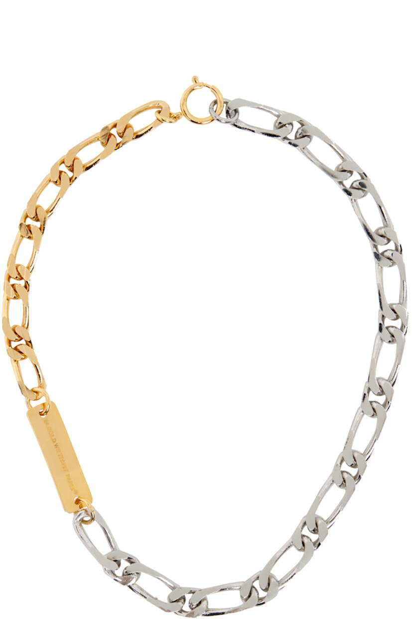 Handcrafted figaro chain necklace in palladium-plated and 18k gold-plated brass. 

· Logo plaque at face
· Spring-ring fastening 
· L19 in

Supplier color: Gold/Silver