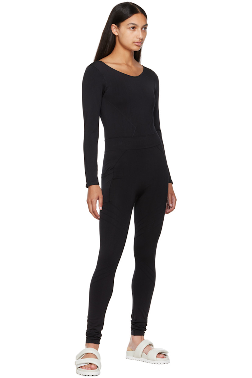 Sweat-wicking, chlorine-resistant, and quick-drying stretch nylon jersey bodysuit. 

· Scoop neck
· Raised line detailing at front
· Low back
· Partially lined

Supplier color: Black

Size 1 is equivalent to US 2-12
Size 2 is equivalent to US 14-20