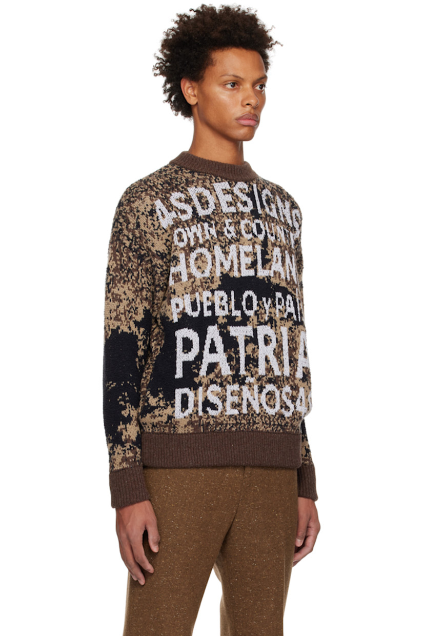Knit wool-blend sweater. Jacquard graphic pattern and bouclé graphic appliqués throughout.

· Rib knit crewneck, hem, and cuffs
· Seam pockets

Supplier color: Multi