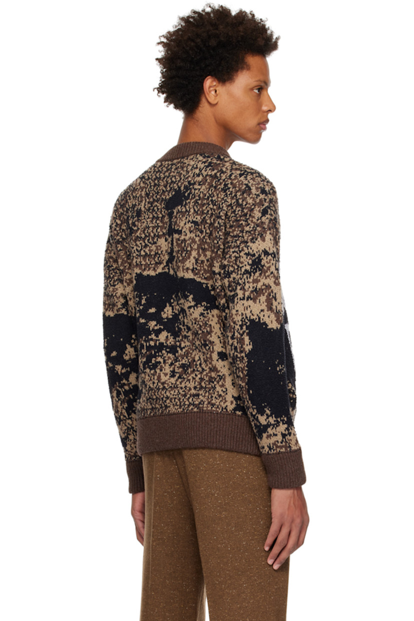 Knit wool-blend sweater. Jacquard graphic pattern and bouclé graphic appliqués throughout.

· Rib knit crewneck, hem, and cuffs
· Seam pockets

Supplier color: Multi