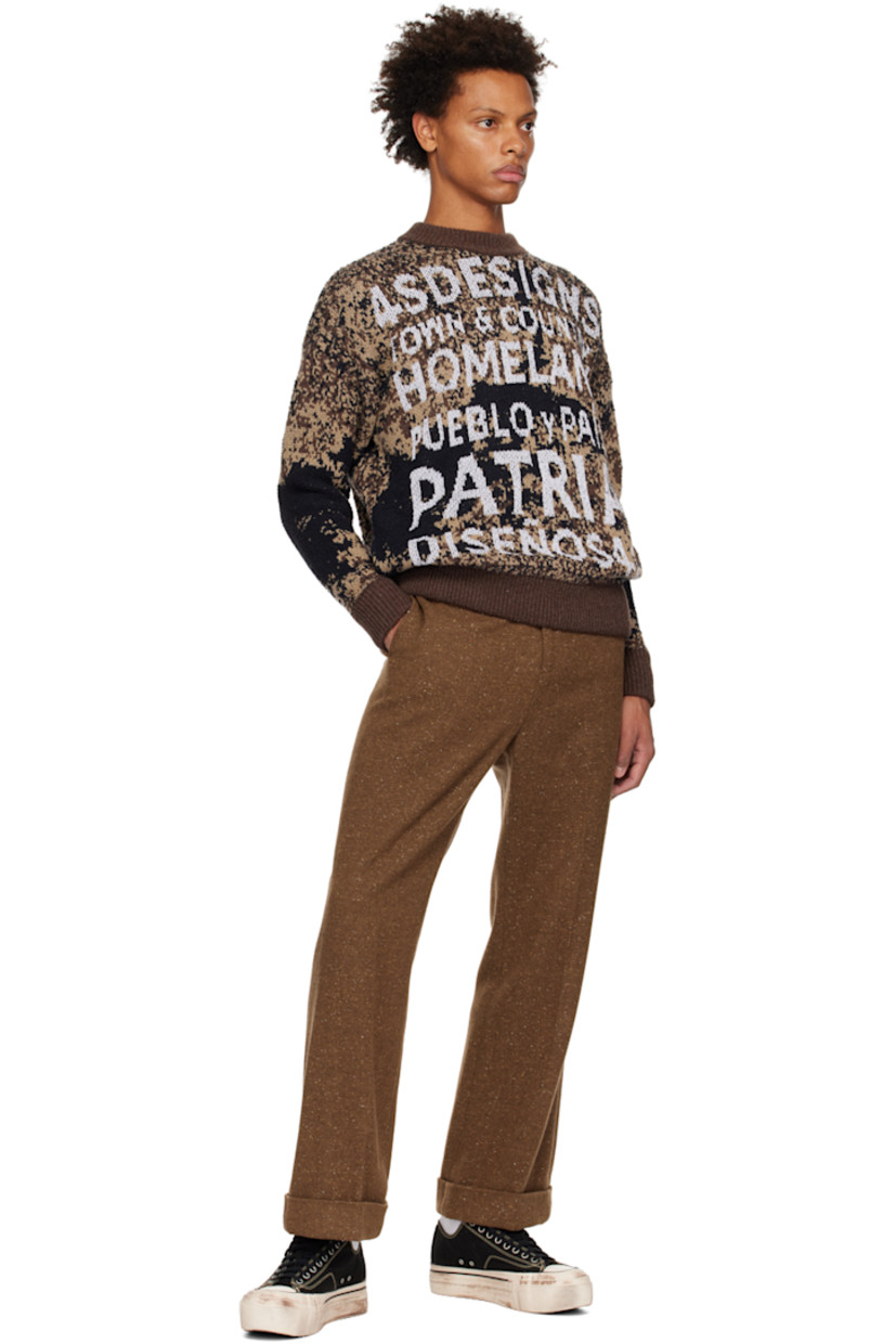 Knit wool-blend sweater. Jacquard graphic pattern and bouclé graphic appliqués throughout.

· Rib knit crewneck, hem, and cuffs
· Seam pockets

Supplier color: Multi