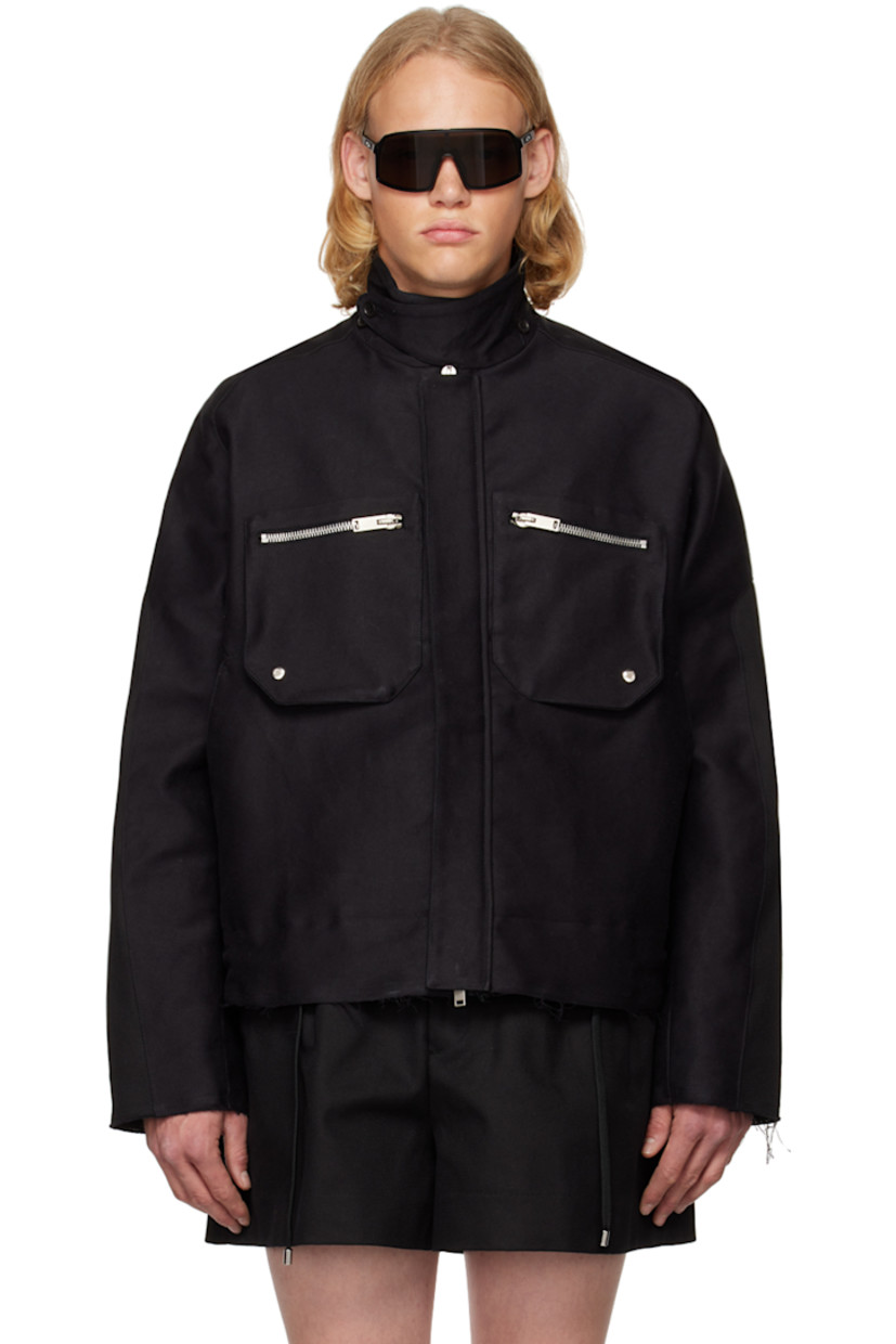 Cotton twill jacket. 

· Paneled construction
· Pointed collar
· Concealed zip closure
· Zip and welt pockets
· Frayed edge at hem and cuffs
· Press-stud detailing at back

Available exclusively at SSENSE.

Supplier color: Black