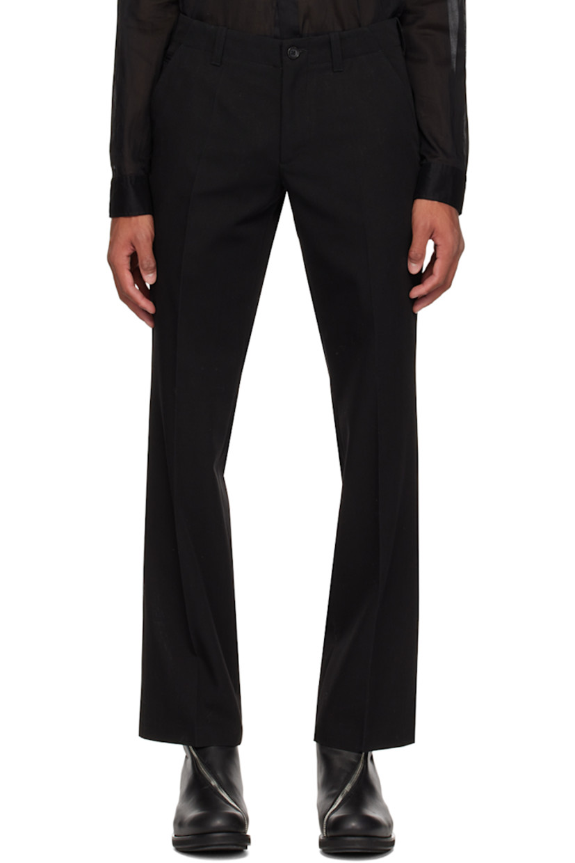 Virgin wool delaine trousers.

· Belt loops
· Five-pocket styling
· Zip-fly
· Creased legs
· Partial plain-woven cotton and satin lining

Available exclusively at SSENSE.

Supplier color: Black
