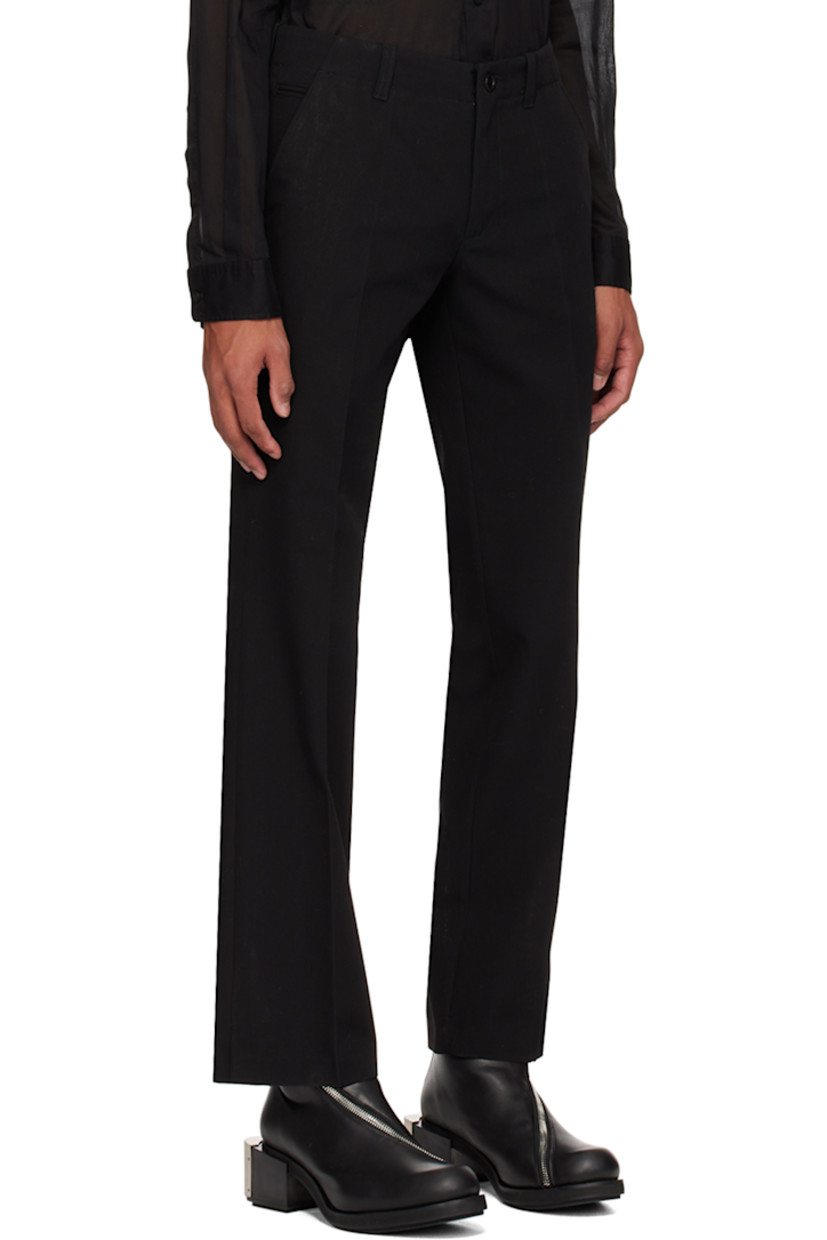Virgin wool delaine trousers.

· Belt loops
· Five-pocket styling
· Zip-fly
· Creased legs
· Partial plain-woven cotton and satin lining

Available exclusively at SSENSE.

Supplier color: Black