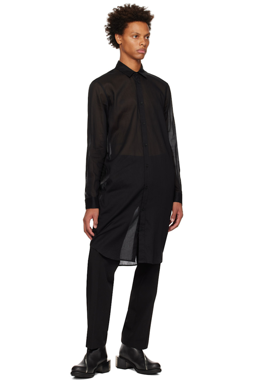 Virgin wool delaine trousers.

· Belt loops
· Five-pocket styling
· Zip-fly
· Creased legs
· Partial plain-woven cotton and satin lining

Available exclusively at SSENSE.

Supplier color: Black