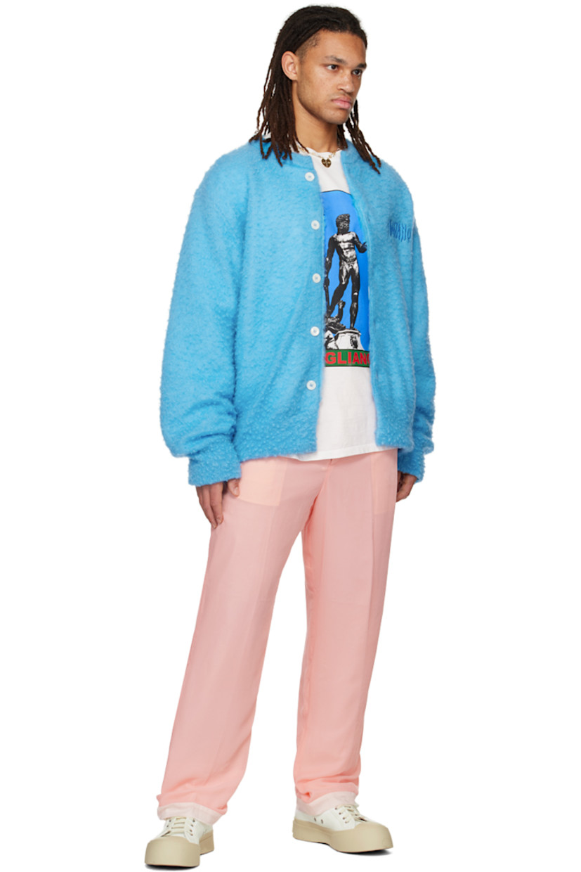 Polyester velvet trousers.

· Belt loops
· Four-pocket styling
· Zip-fly
· Pleats at front
· Full plain-woven cotton lining

Supplier color: Pink
