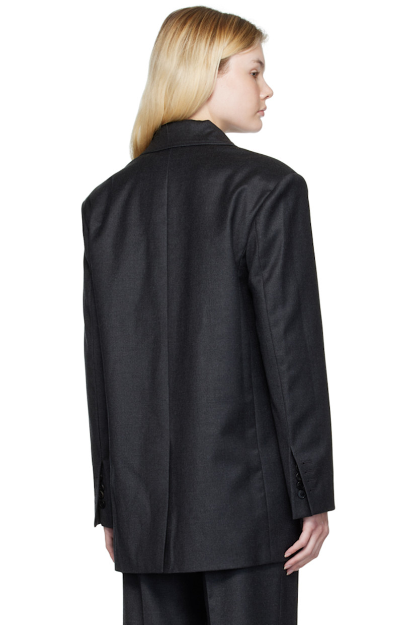 Stretch wool flannel blazer.

· Notched lapel
· Three-button closure
· Welt pocket, darts, and welt pockets
· Padded shoulders
· Four-button surgeon's cuffs
· Central vent at back hem
· Full  bemberg-blend satin lining

Supplier color: Gray