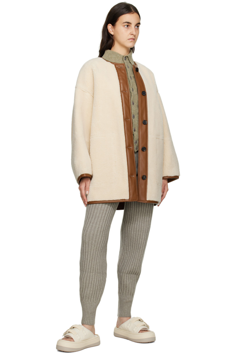 Rib knit acrylic and wool-blend lounge pants. Elasticized waistband and cuffs.

Supplier color: Beige