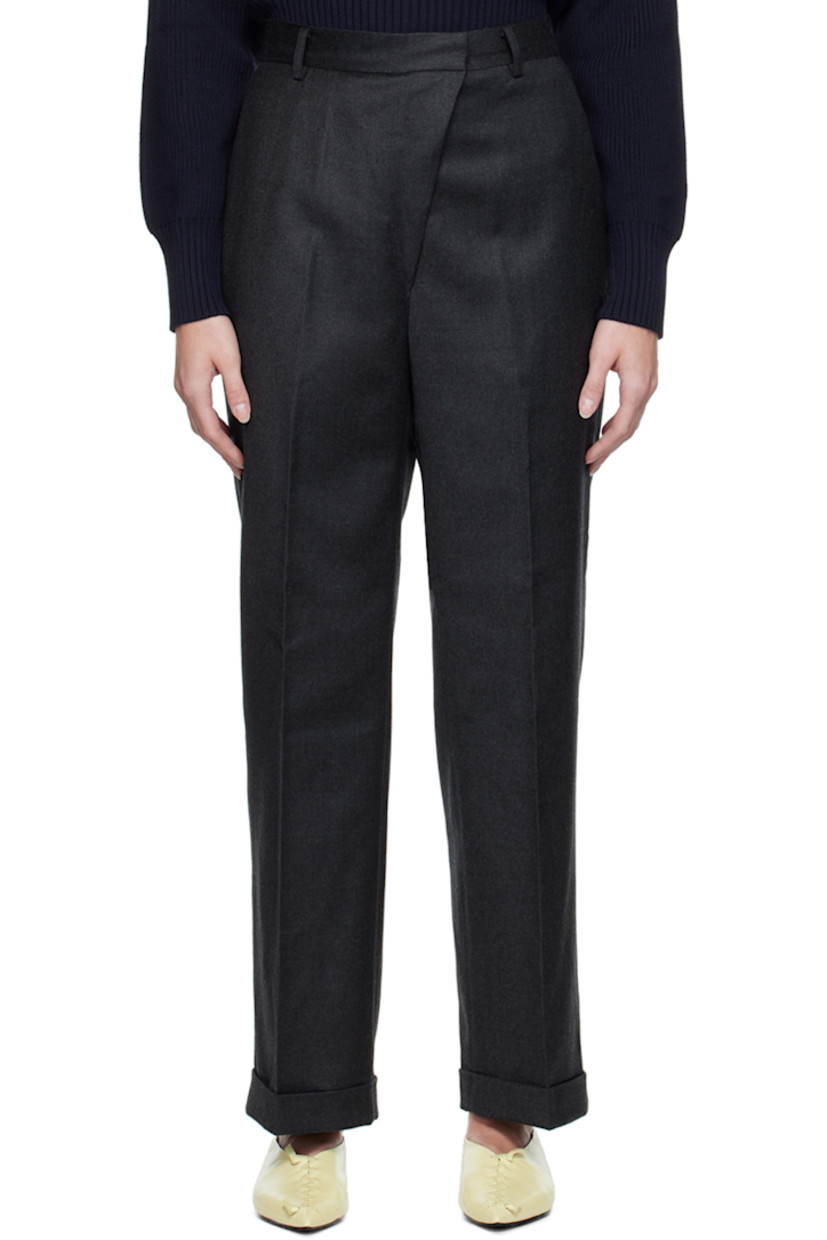 Stretch wool flannel trousers.

· Belt loops
· Four-pocket styling
· Zip-fly
· Crease at front and back legs
· Rolled cuffs
· Partial polyester satin lining

Supplier color: Gray