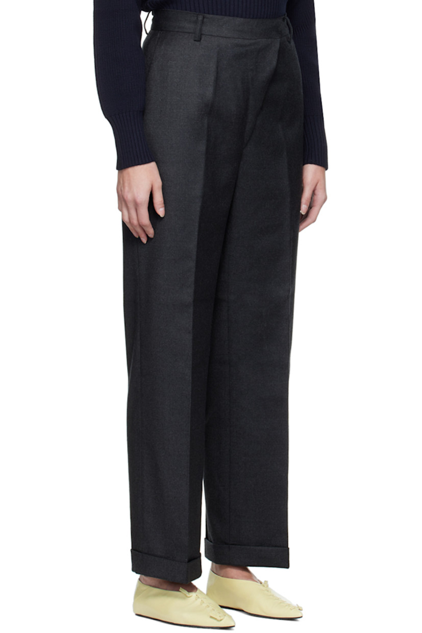 Stretch wool flannel trousers.

· Belt loops
· Four-pocket styling
· Zip-fly
· Crease at front and back legs
· Rolled cuffs
· Partial polyester satin lining

Supplier color: Gray