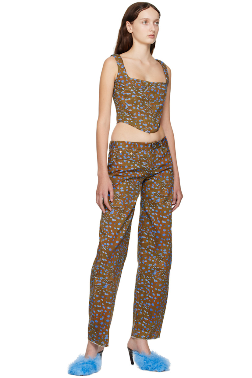 Wide-leg non-stretch denim jeans. Graphic pattern printed throughout. 

· Low-rise
· Belt loops
· Five-pocket styling
· Zip-fly
· Logo graphics embroidered at back 
· Contrast stitching in black

Supplier color: Stingray