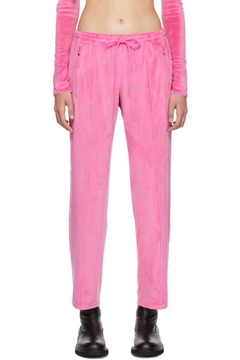 Stretch polyester velour lounge pants. 

· Drawstring at elasticized waistband
· Two-pocket styling
· Pinched seam at legs
· Press-stud vent at cuffs

Supplier color: Hot pink