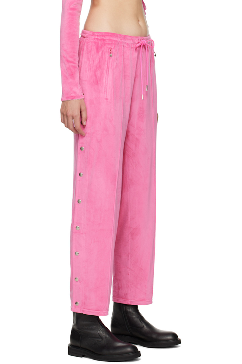 Stretch polyester velour lounge pants. 

· Drawstring at elasticized waistband
· Two-pocket styling
· Pinched seam at legs
· Press-stud vent at cuffs

Supplier color: Hot pink