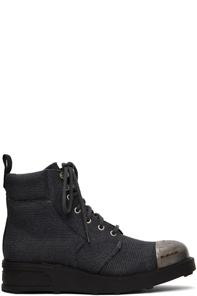 Ankle-high canvas lace-up boots in gray.

· Round metal cap toe
· Lace-up closure
· Padded collar
· Webbing pull-loop at heel tab
· Organic cotton canvas lining
· Logo embossed at heel counter
· Treaded rubber sole

Supplier color: Anthracite gray