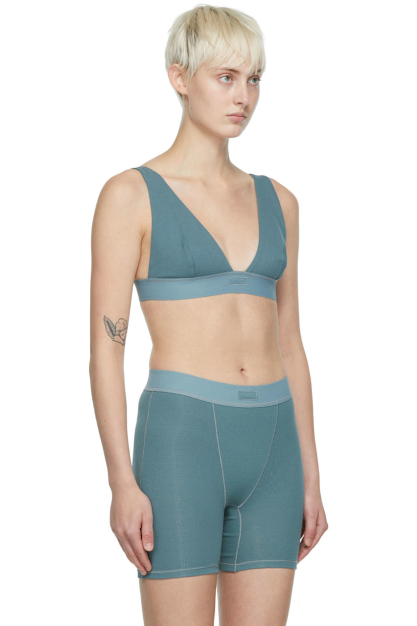 Rib knit stretch cotton bra. 

· V-neck
· Adjustable elasticized shoulder straps
· Elasticized hem

Supplier color: Kyanite