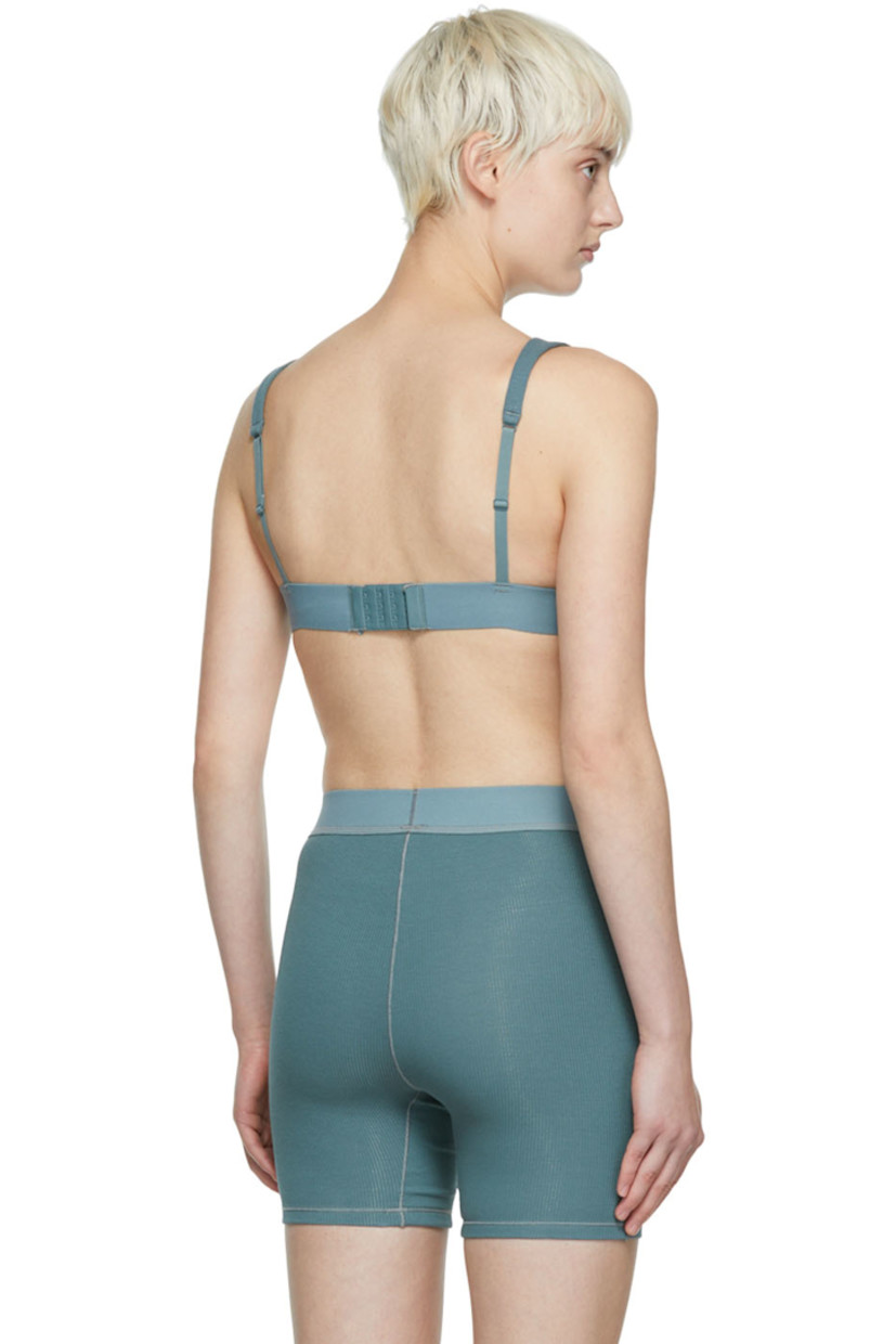 Rib knit stretch cotton bra. 

· V-neck
· Adjustable elasticized shoulder straps
· Elasticized hem

Supplier color: Kyanite