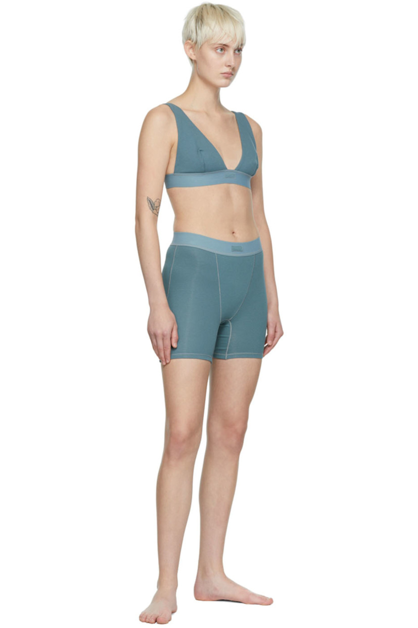 Rib knit stretch cotton bra. 

· V-neck
· Adjustable elasticized shoulder straps
· Elasticized hem

Supplier color: Kyanite
