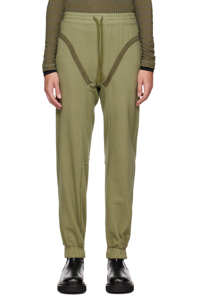 French terry lounge pants. 

· Paneled construction
· Drawstring at elasticized waistband 
· Two-pocket styling 
· Elasticized cuffs 
· Cutouts at back 

Available exclusively at SSENSE. 

Supplier color: Khaki