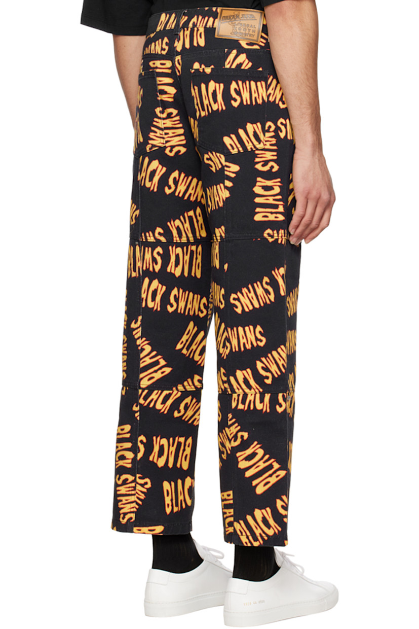 Non-stretch denim jeans. Text printed throughout.

· Paneled construction
· Belt loops
· Five-pocket styling
· Zip-fly
· Logo patch at front and back waistband
· Contrast stitching in tan

Supplier color: Black