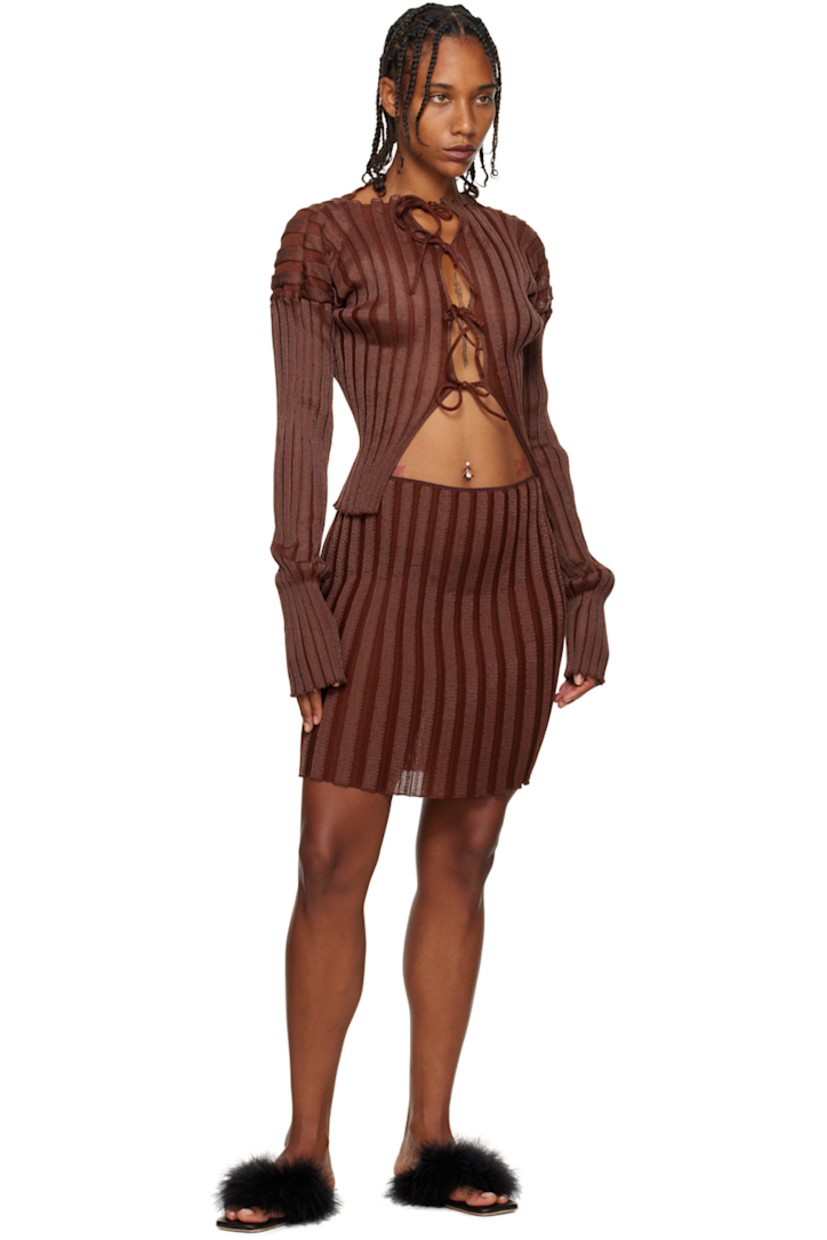 Semi-sheer rib knit cotton and nylon-blend skirt. 

Supplier color: Chestnut