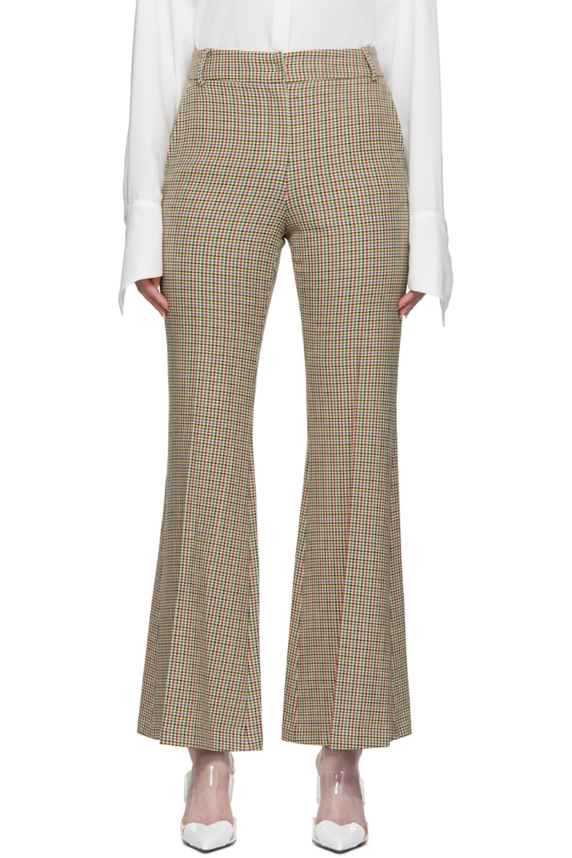Flared stretch polyester and viscose-blend tweed trousers. Houndstooth pattern throughout. 

· Belt loops
· Four-pocket styling
· Zip-fly
· Partial twill lining

Supplier color: Beige