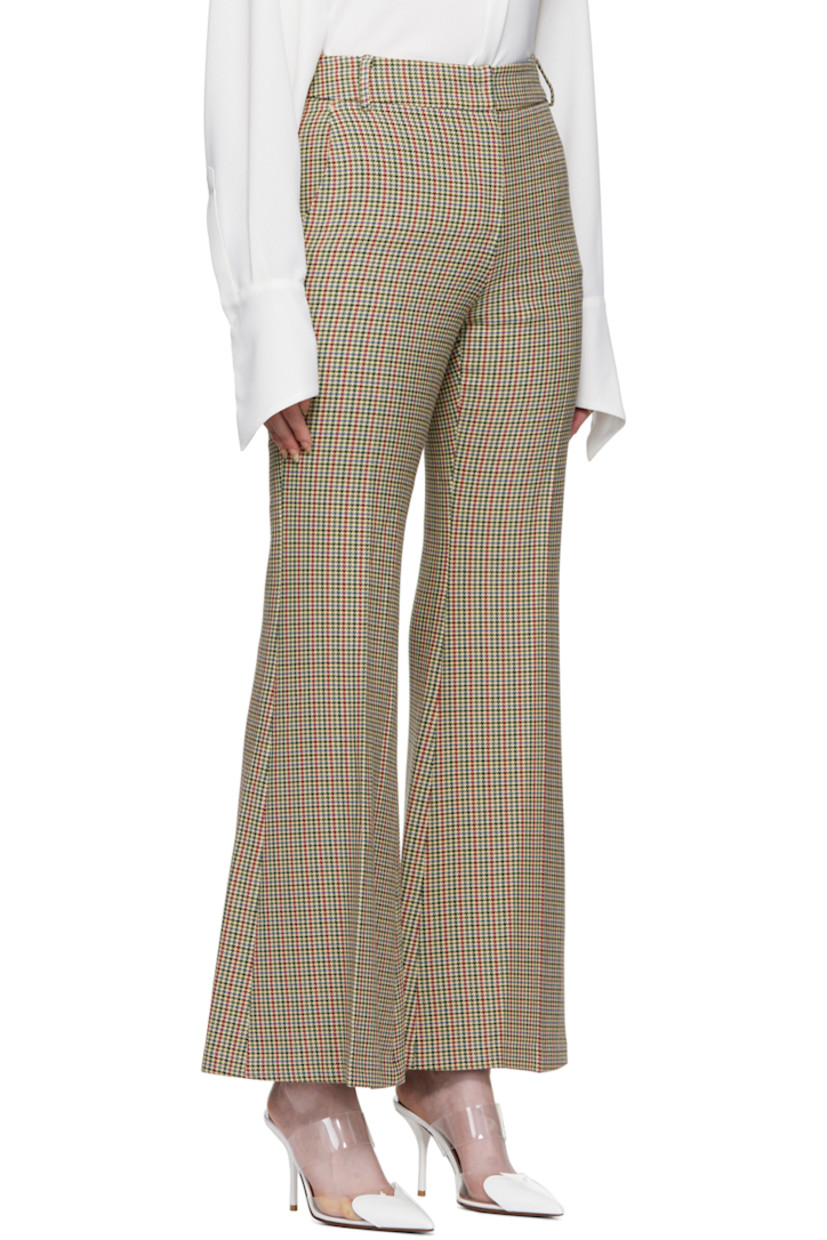 Flared stretch polyester and viscose-blend tweed trousers. Houndstooth pattern throughout. 

· Belt loops
· Four-pocket styling
· Zip-fly
· Partial twill lining

Supplier color: Beige
