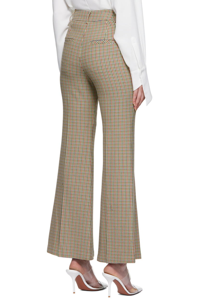 Flared stretch polyester and viscose-blend tweed trousers. Houndstooth pattern throughout. 

· Belt loops
· Four-pocket styling
· Zip-fly
· Partial twill lining

Supplier color: Beige