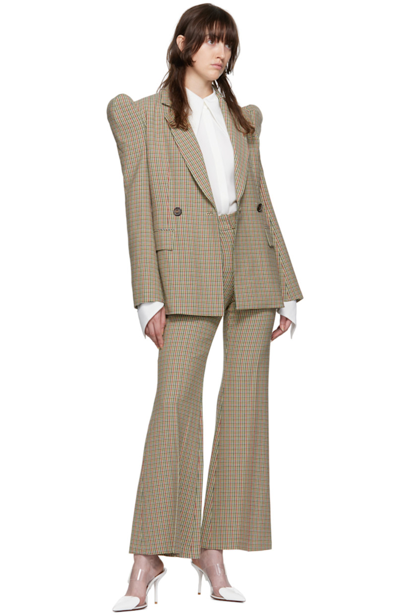 Flared stretch polyester and viscose-blend tweed trousers. Houndstooth pattern throughout. 

· Belt loops
· Four-pocket styling
· Zip-fly
· Partial twill lining

Supplier color: Beige