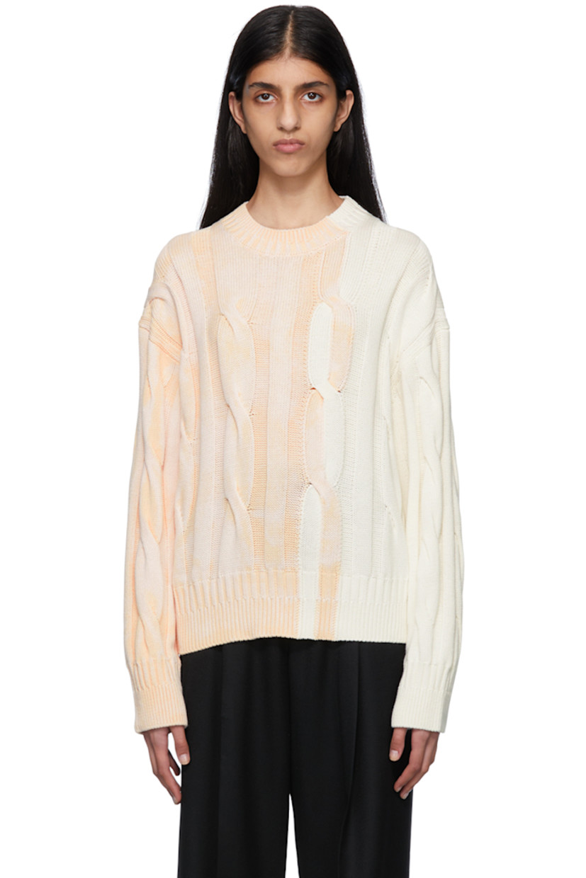Cable knit cotton sweater. Acid wash effect throughout. 

· Rib knit crewneck, cuffs, and hem
· Rubberized logo patch at back collar

Supplier color: Off-White/Beige