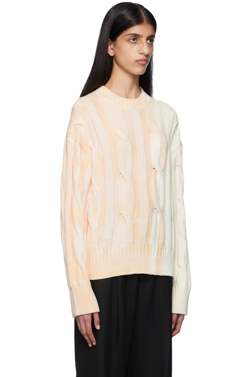 Cable knit cotton sweater. Acid wash effect throughout. 

· Rib knit crewneck, cuffs, and hem
· Rubberized logo patch at back collar

Supplier color: Off-White/Beige