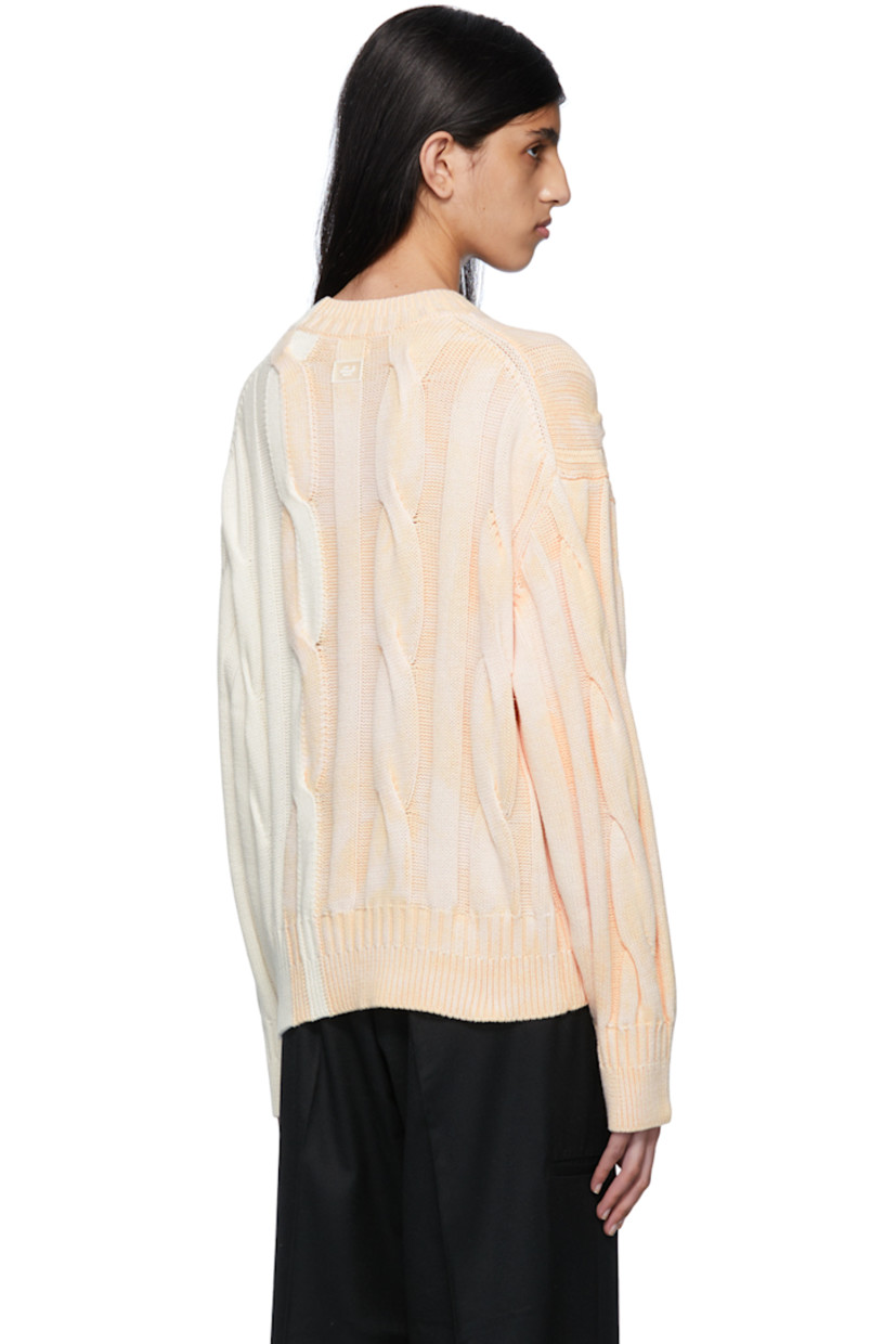 Cable knit cotton sweater. Acid wash effect throughout. 

· Rib knit crewneck, cuffs, and hem
· Rubberized logo patch at back collar

Supplier color: Off-White/Beige