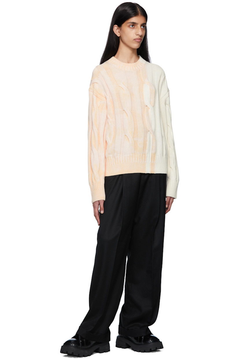 Cable knit cotton sweater. Acid wash effect throughout. 

· Rib knit crewneck, cuffs, and hem
· Rubberized logo patch at back collar

Supplier color: Off-White/Beige