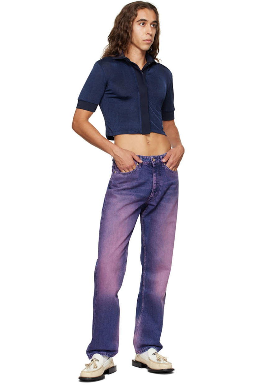 Stretch polyester jersey polo.

· Rib knit spread collar and cuffs
· Concealed press-stud closure
· Logo embroidered at front hem

Supplier color: Deep sea