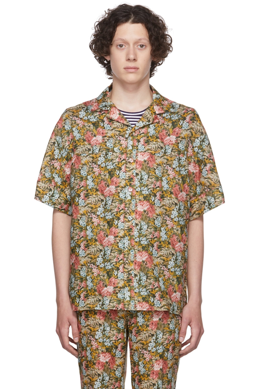 Plain-woven linen shirt. Floral pattern throughout. 

· Open spread collar 
· Button closure  
· Shirttail hem 

Supplier color: Pink