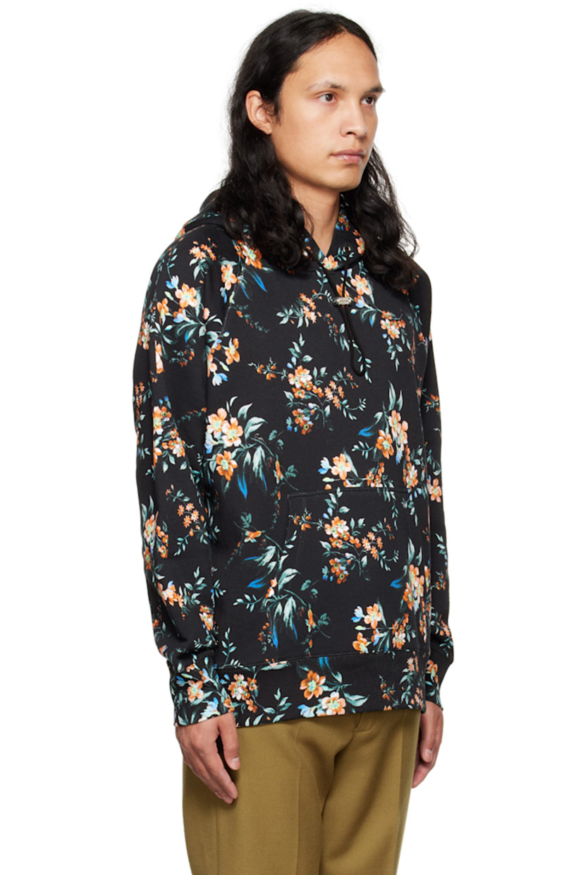 Cotton fleece hoodie. Floral pattern printed throughout. 

· Drawstring at hood
· Kangaroo pocket 
· Rib knit hem and cuffs
· Eyelet detailing at side seam
· Raglan sleeves 

Supplier color: Black/Multi