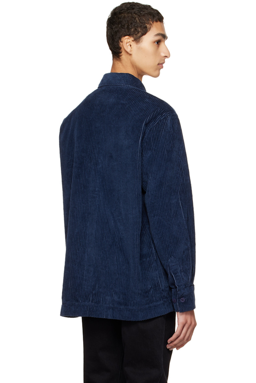 Cotton-blend corduroy shirt. 

· Spread collar
· Concealed button closure
· Patch pocket
· Logo disc at front
· Adjustable single-button barrel cuffs

Supplier color: Navy