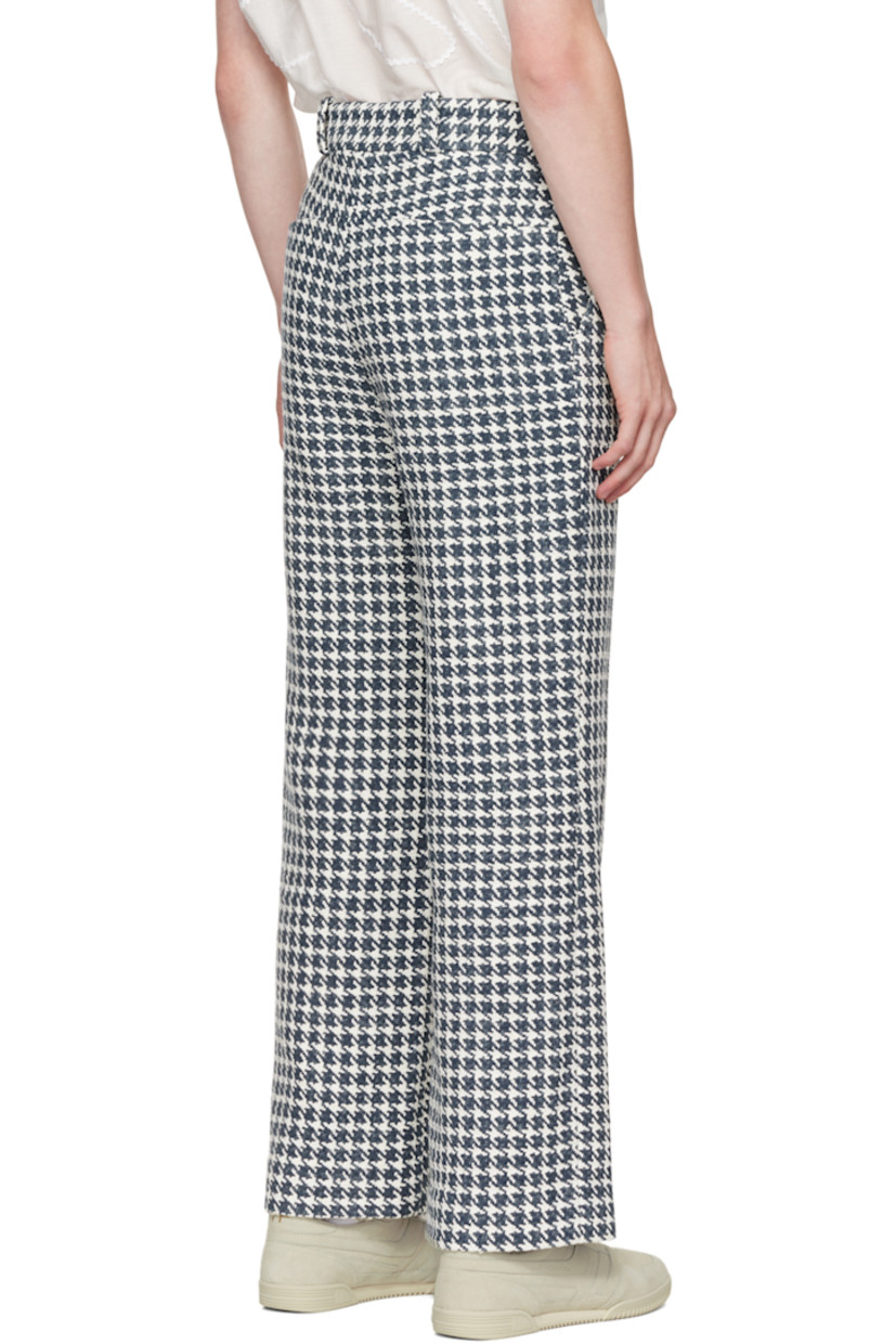 Cotton and polyester-blend tweed trousers. Houndstooth pattern throughout.

· High-rise
· Belt loops
· Four-pocket styling
· Zip-fly
· Full cotton-blend twill lining

Supplier color: Navy