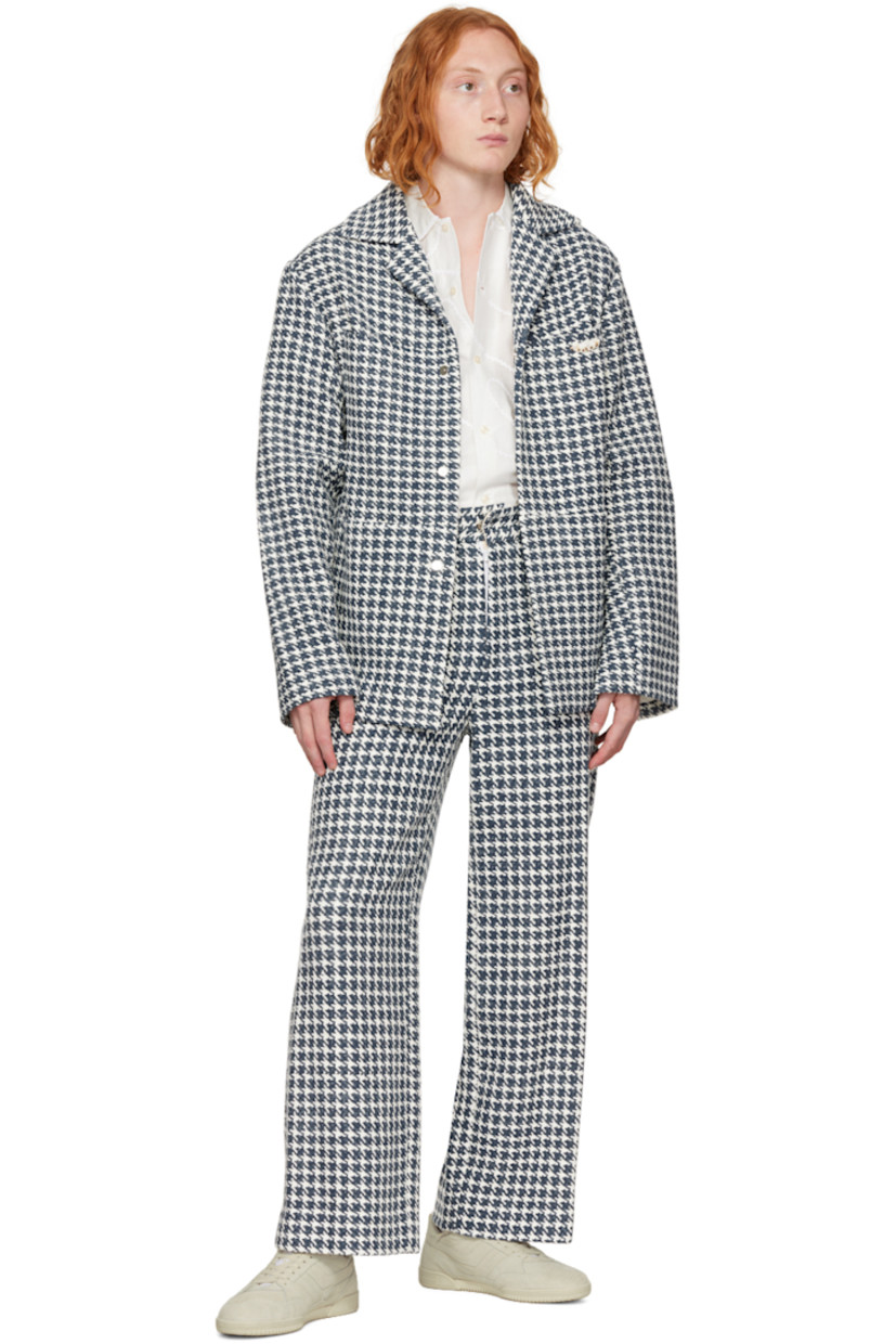 Cotton and polyester-blend tweed trousers. Houndstooth pattern throughout.

· High-rise
· Belt loops
· Four-pocket styling
· Zip-fly
· Full cotton-blend twill lining

Supplier color: Navy