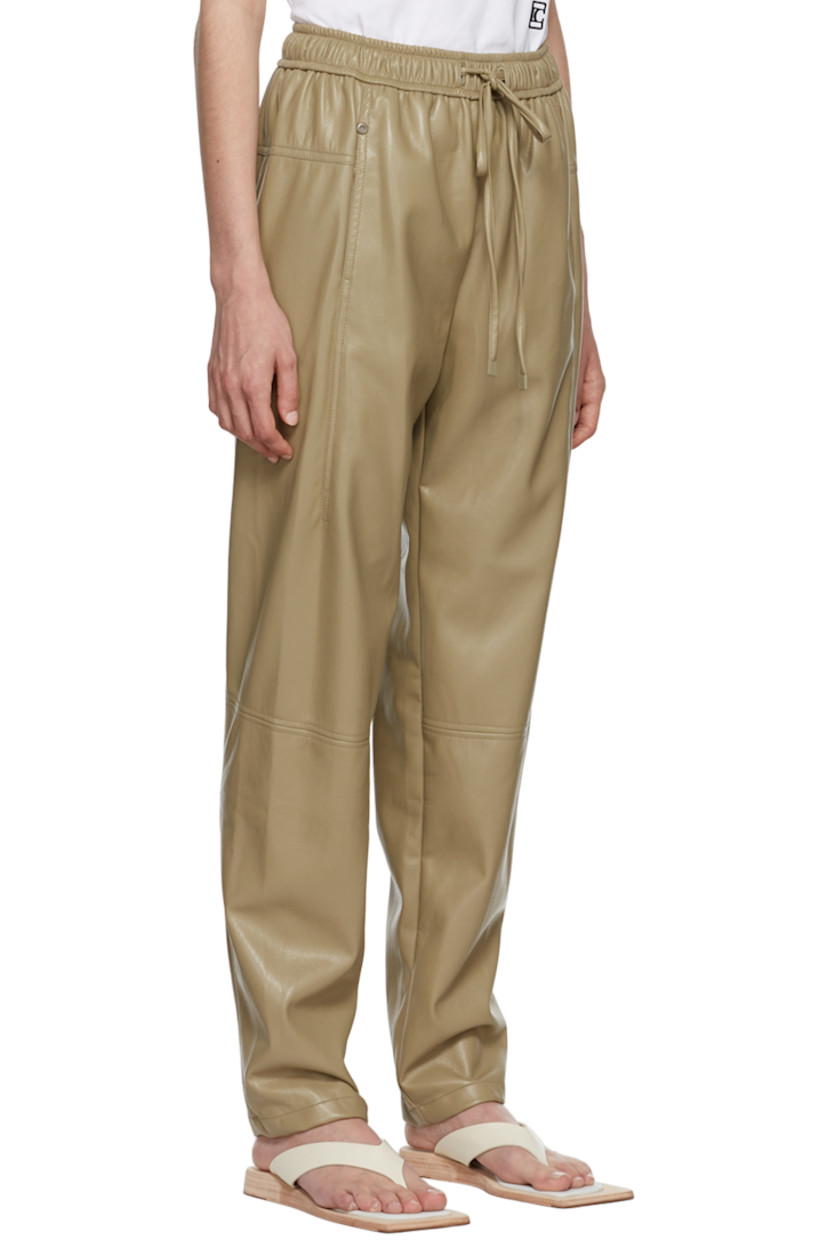 Faux-leather pants.

· Drawstring at elasticized waistband
· Two-pocket styling

Supplier color: Khaki beige