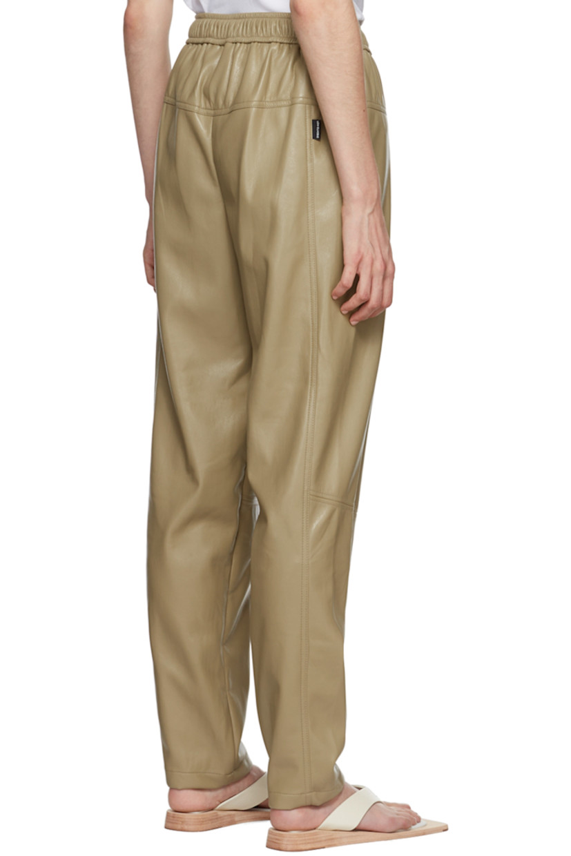 Faux-leather pants.

· Drawstring at elasticized waistband
· Two-pocket styling

Supplier color: Khaki beige
