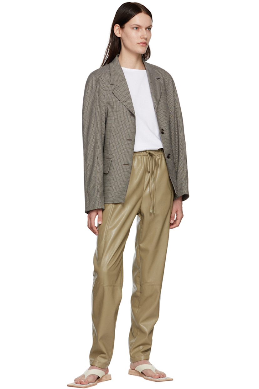 Faux-leather pants.

· Drawstring at elasticized waistband
· Two-pocket styling

Supplier color: Khaki beige