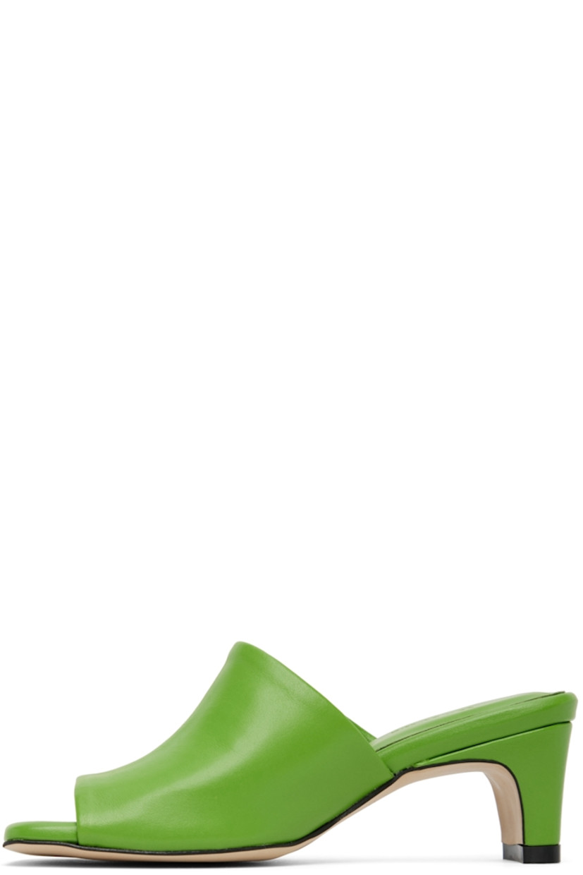 Buffed leather heeled sandals in green.

· Open square toe
· Logo embossed at padded leather footbed 
· Covered block heel with rubber injection
· Leather sole in beige
· Heel: H2 in

Supplier color: Green