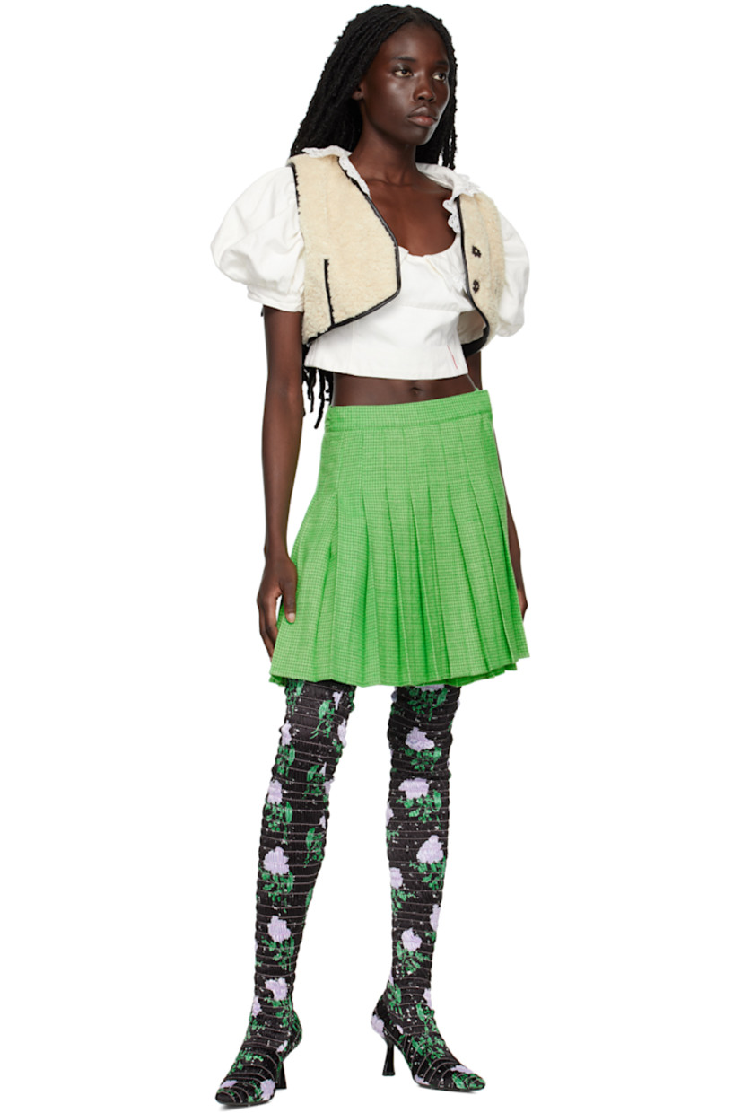 Virgin wool and viscose-blend houndstooth skirt.

· Wrap construction 
· Pin-buckle and hook-eye fastening at waistband 
· Fringed detailing at front
· Adjustable pin-buckle tab at back waistband 
· Unlined 

Supplier color: Lime green/Green