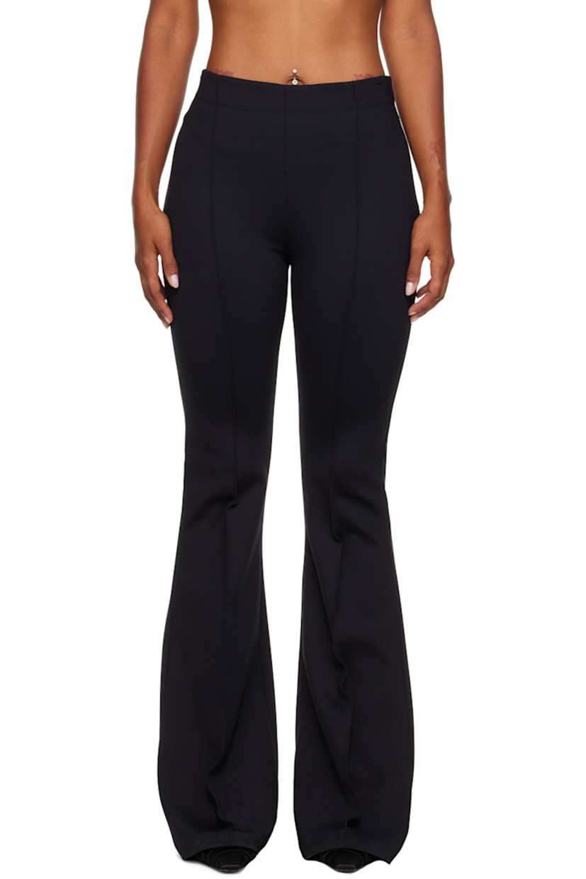 Stretch nylon interlock jersey trousers. 

· Elasticzied waistband 
· Pinched seams at front 
· Flared hem 

Supplier color: Black