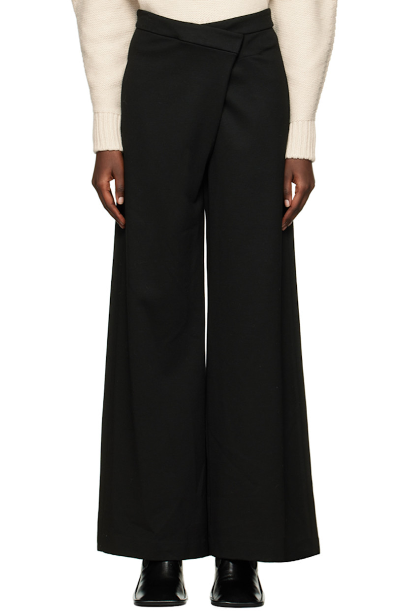 Knit stretch viscose trousers.

· Wrap construction
· Belt loops
· Two-pocket styling
· Pleat at front
· Partial viscose satin lining

Supplier color: Black